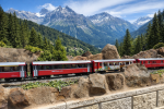 Swiss alpine railway with RhB train.png