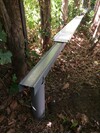 U-profile on top of pipe and TRESPA on top of U-profile both connected with pop-nails.JPG